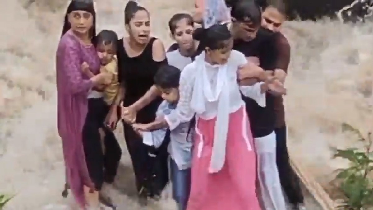 Video shows tragic moment an Indian family is swept away by floodwaters | Floods