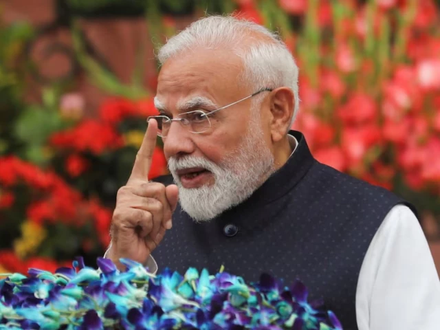 India PM Modi announces panel to overhaul exam system after protests