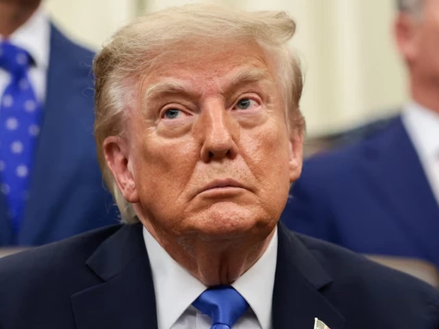 Trump criticizes Canadian dollar 'imbalance' as trade tensions intensify